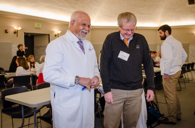 Dr. Mika Sinanan in a meeting room