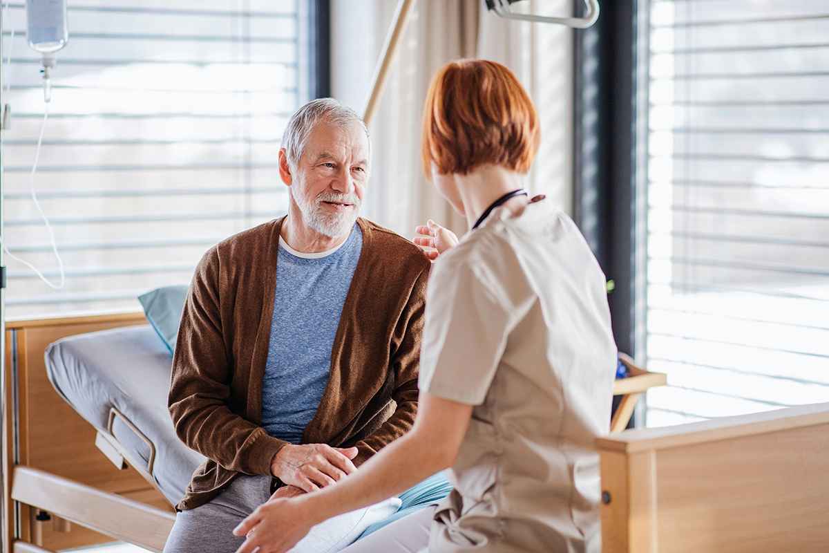 image of senior male patient with physician