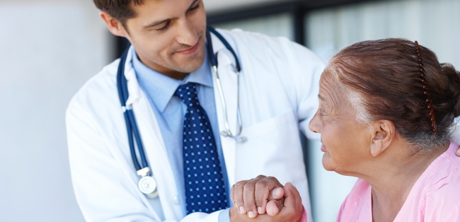 doctor holding the hand of a patient