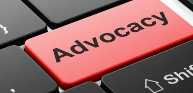 keyboard key with advocacy written on it