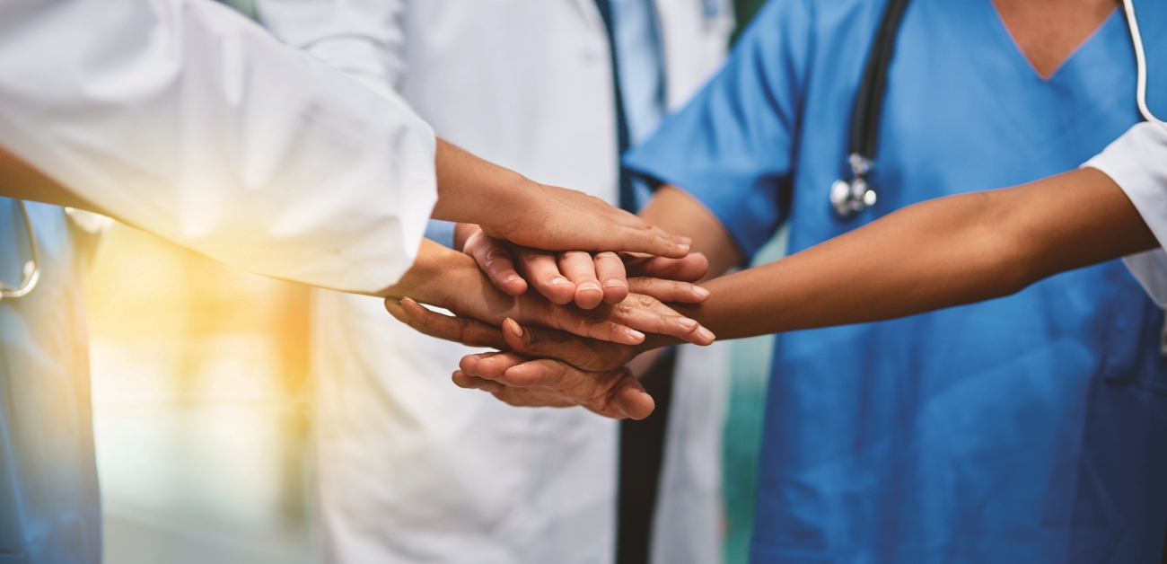 hands in circle showing teamwork