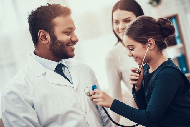young doctor with child and mother
